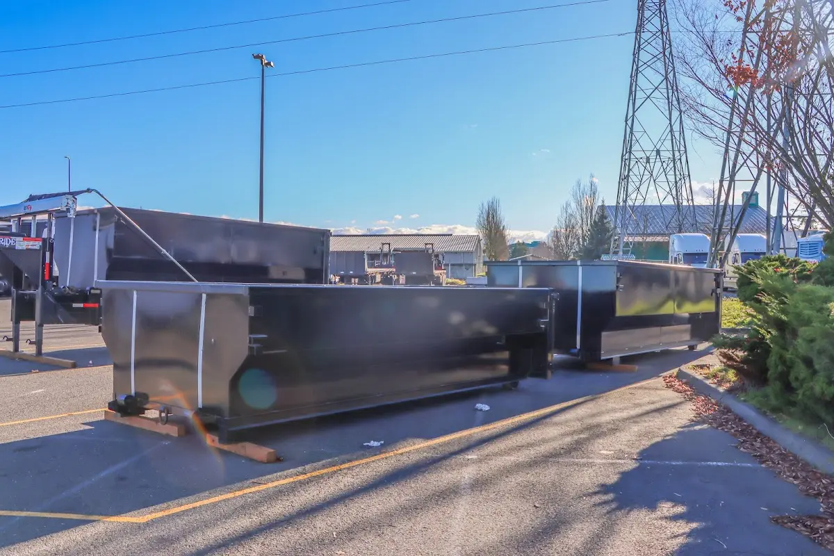 Roll-off dumpster ready for waste disposal at job site for 2 Yard Dumpster Rental in Little Ferry